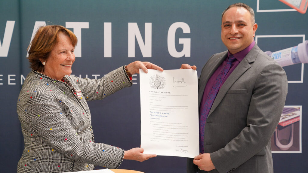 Clare, Countess of Euston, His Majesty’s Lord-Lieutenant of Suffolk, presented Sash Ali, finance director of Green Rhino with the official Grant of Appointment for the King's Award for Enterprise in Innovation.